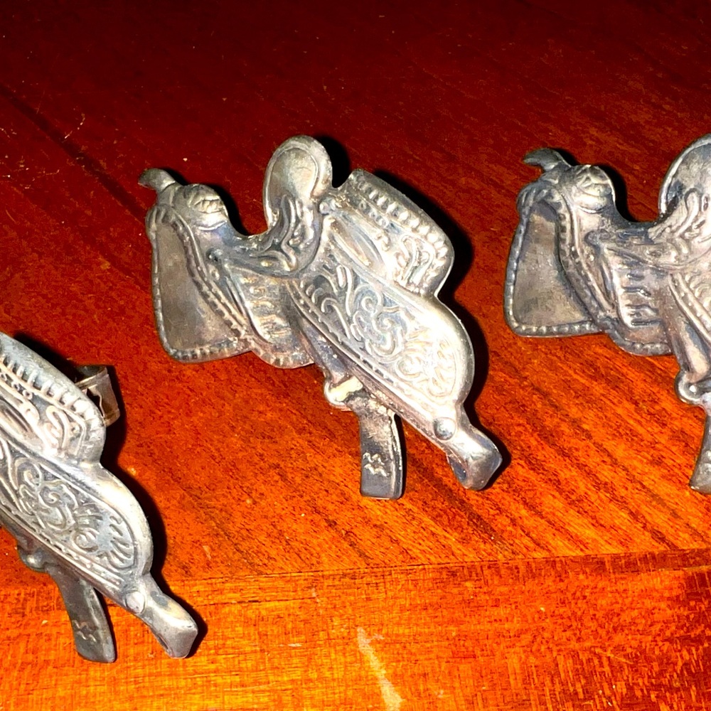 Silver saddle napkin rings. Set of 3